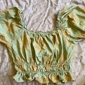 gorgeous corset cinched sage top with gold accents